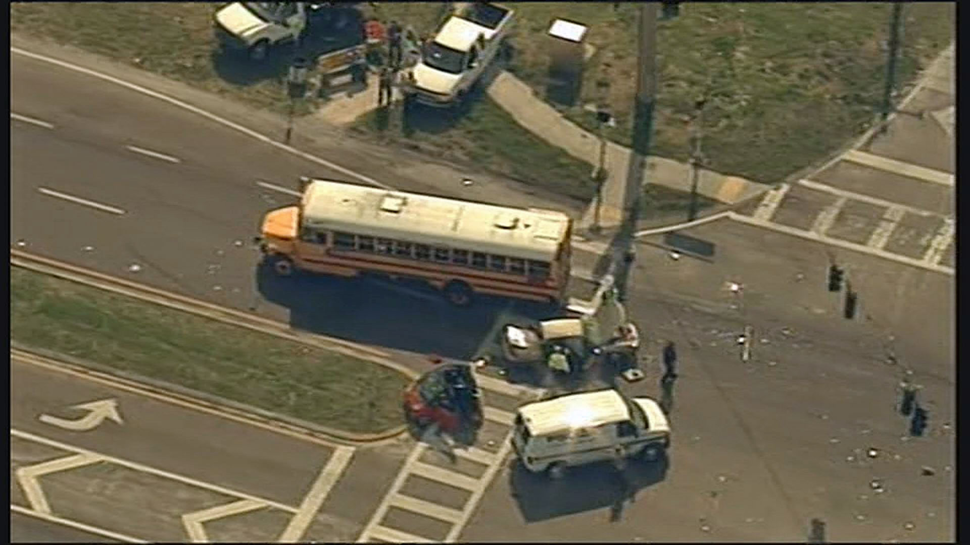 Police: School bus runs red light, crashes into 2 cars | wtsp.com