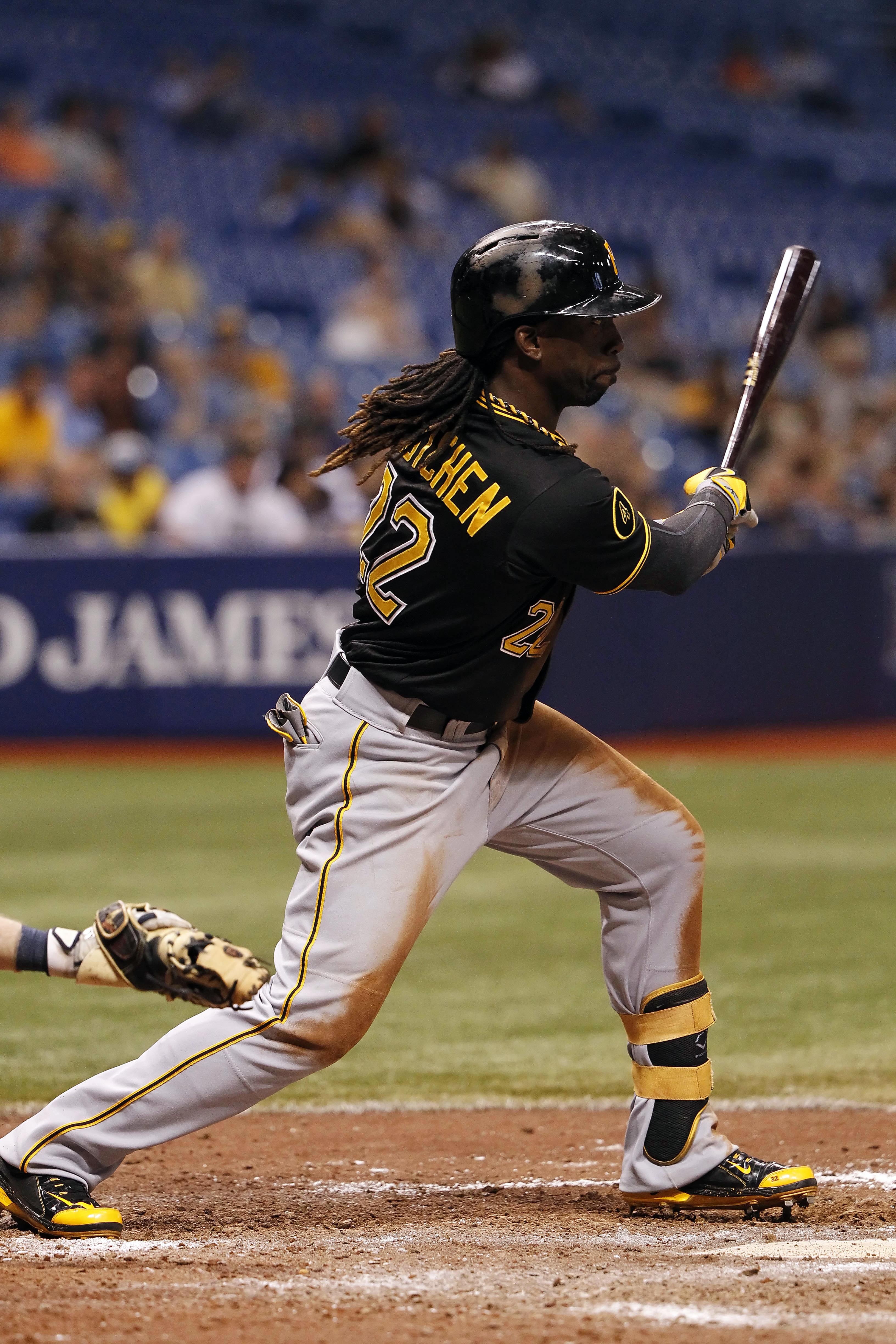 Pittsburgh Pirates Pedro Alvarez tosses his bat and walks to first base  forcing in Andrew McCutchen to score in the fourth inning of the New York  Mets 5-3 win at PNC Park