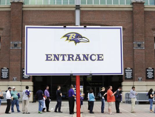 Baltimore Ravens fans wearing Ray Rice jerseys