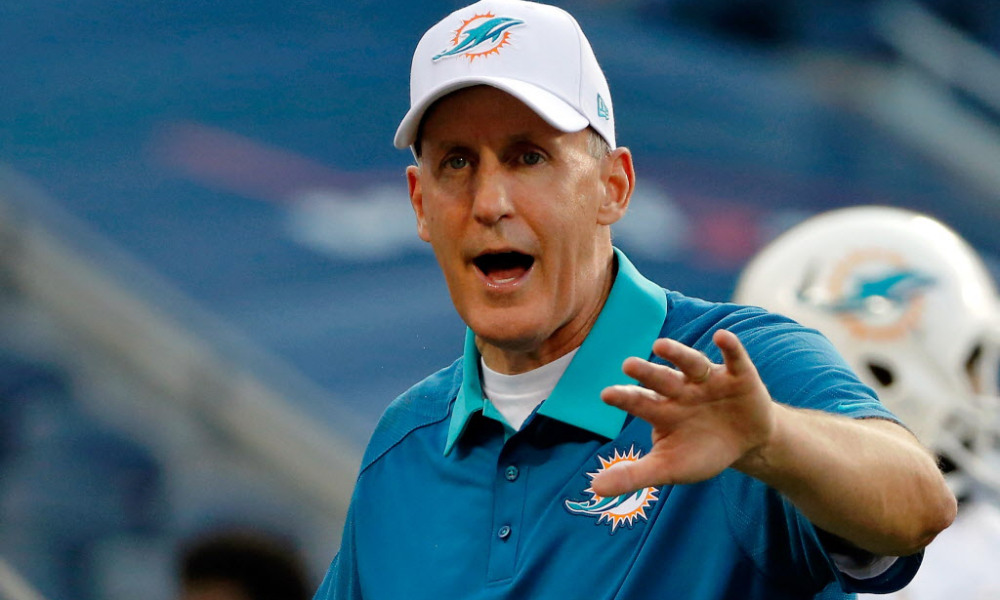 Dolphins coach Joe Philbin busts a move for his players