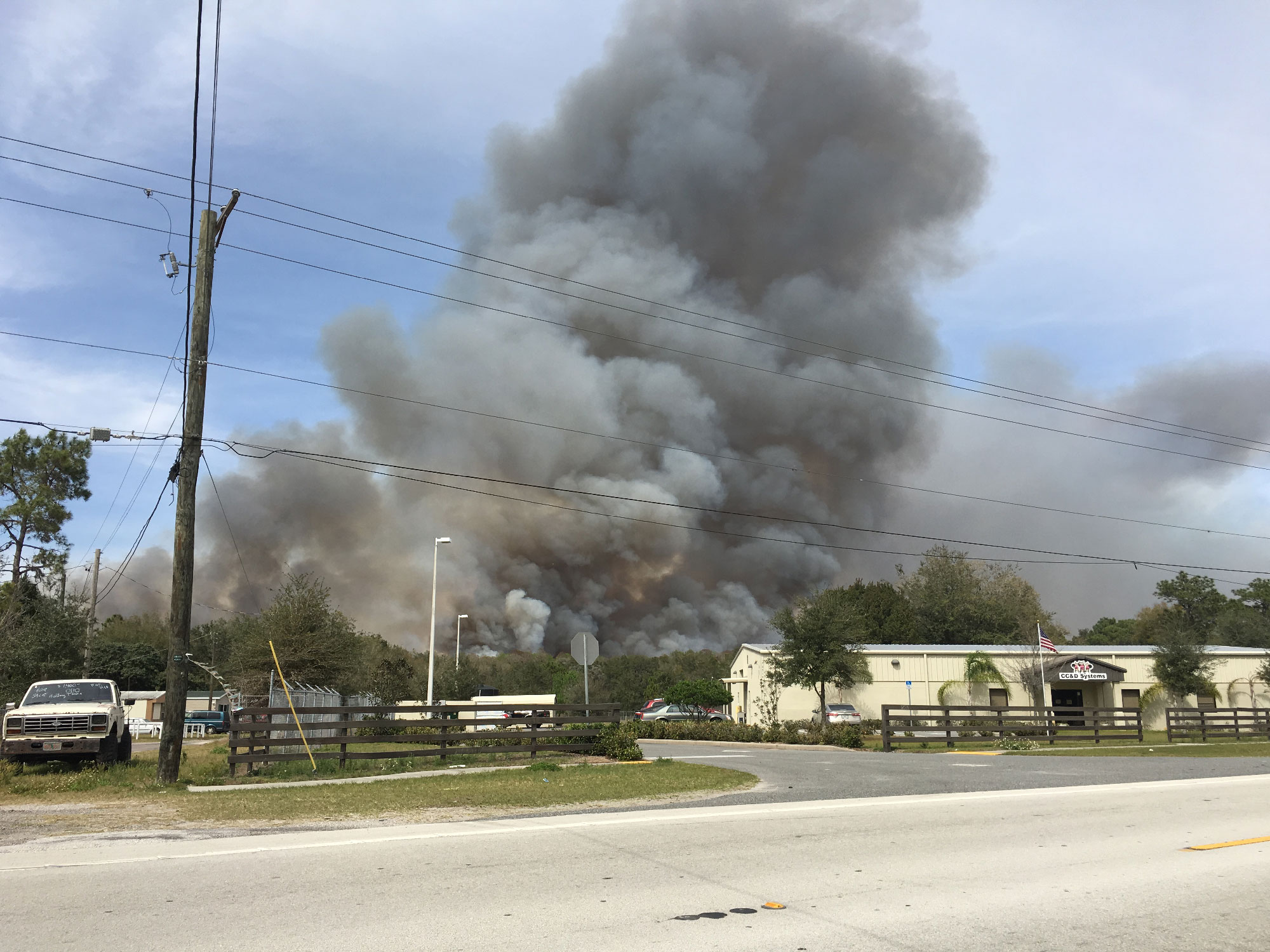 Controlled burn sends up smoke in New Tampa