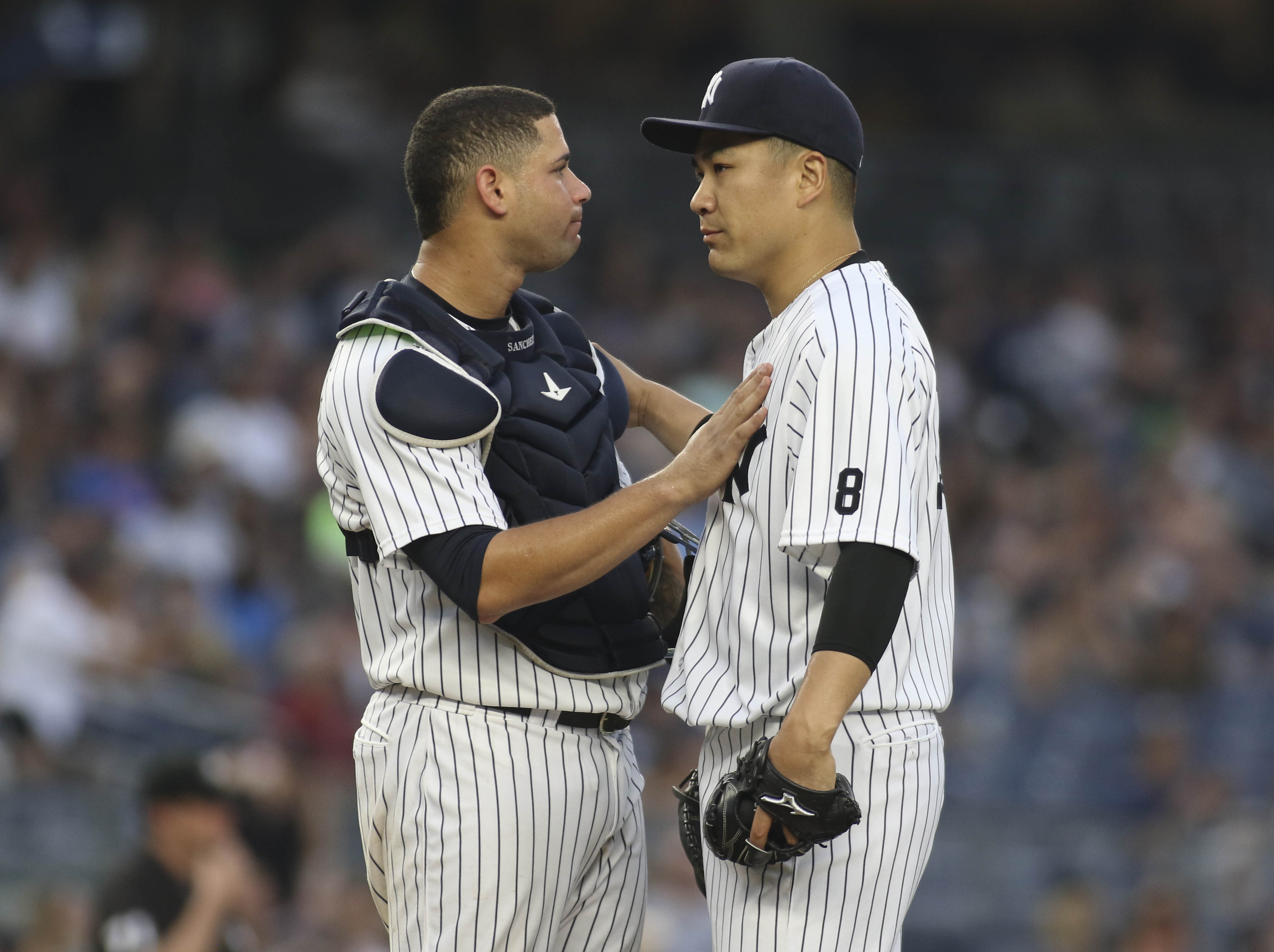 New York Yankees catcher Gary Sanchez, right, and relief pitcher