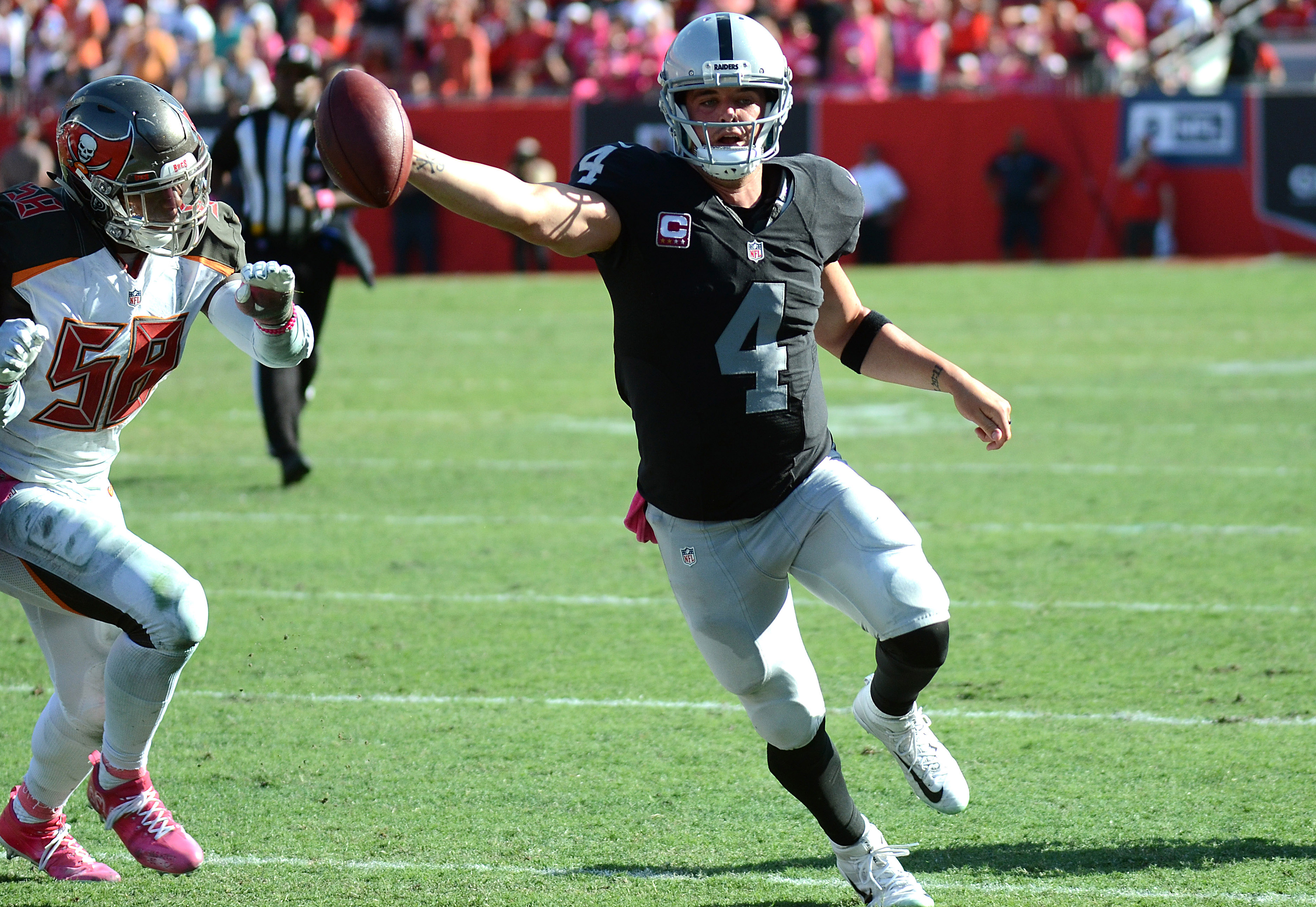 Carr throws for 4 TDs, Raiders outlast Bucs 30-24 in OT