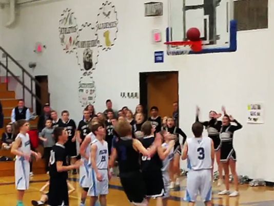 Watch: Middle schoolers lose when ball gets stuck on rim | wtsp.com